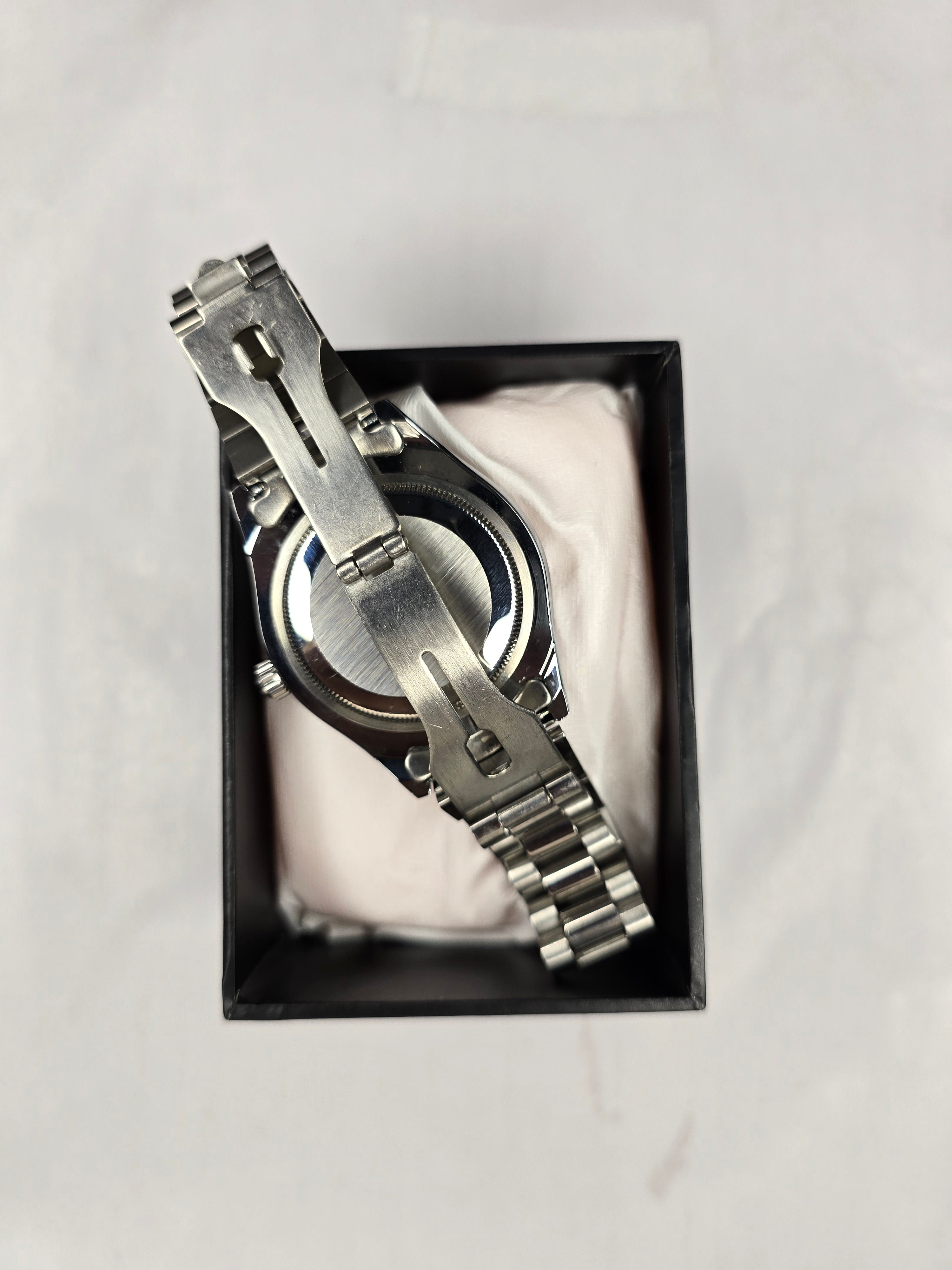 Rolex Datejust 41: Mint Green Dial with Diamond Hour Markers